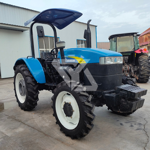 La ferme a utilisé le tracteur de roue de New Holland SNH754. 