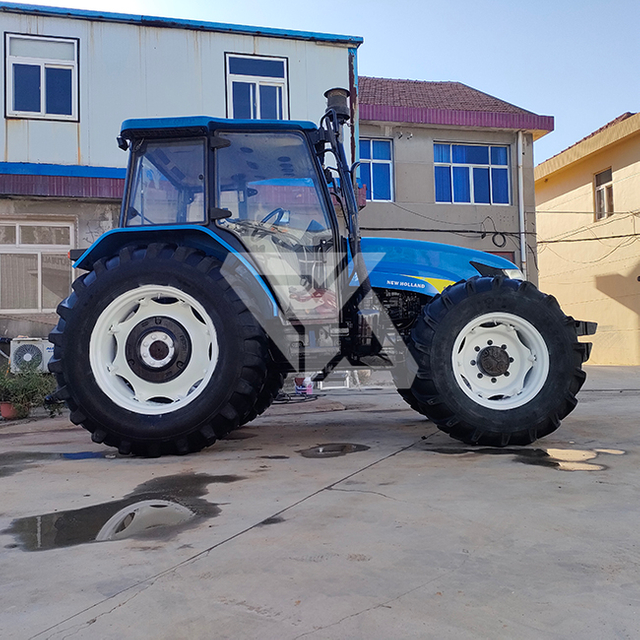 Utilisé New Holland SNH1004 100HP Tracteur 4WD avec Sunshade et équipement agricole