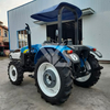 La ferme a utilisé le tracteur de roue de New Holland SNH754. 